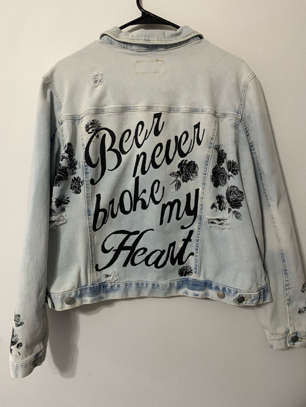 Time and Tru Light Blue Distressed Denim Jacket with Black Floral Accents
